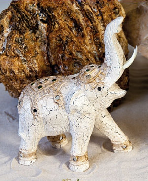 Elefant aufsteigend aus Holz